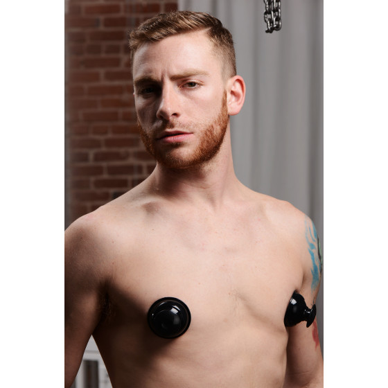 Suce tétonsPlungers en silicone noir