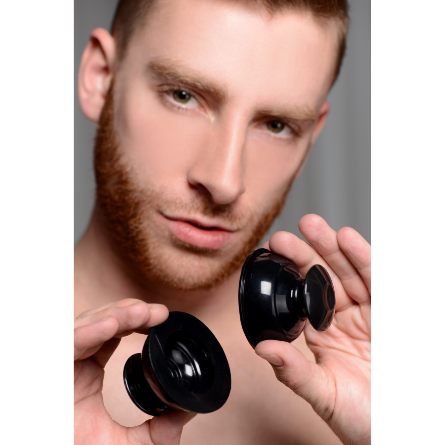 Suce tétonsPlungers en silicone noir