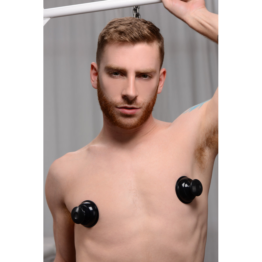 Suce tétonsPlungers en silicone noir